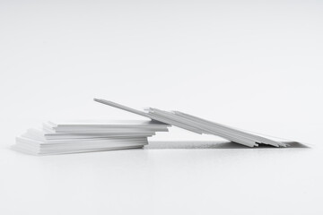 Photo of business cards stack. Template for branding identity. Isolated with clipping path. Mockup   business cards at white  background.