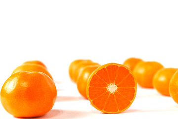 twelve oranges on a white background, isolated