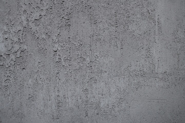 The texture of the concrete wall is an abstract background.