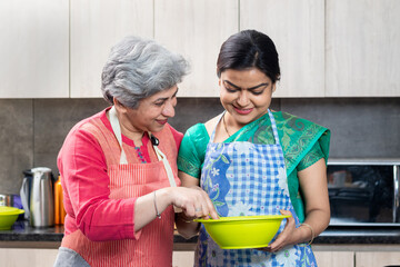 Women in kitchen Preparing food. cooking classes