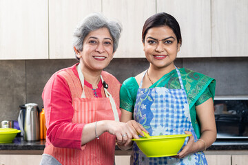 Women in kitchen Preparing food. cooking classes