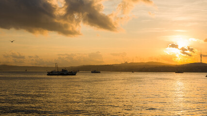 Fototapeta na wymiar Bosphorus on an autumn morning. City line ferries at sunrise. Istanbul -Turkey 