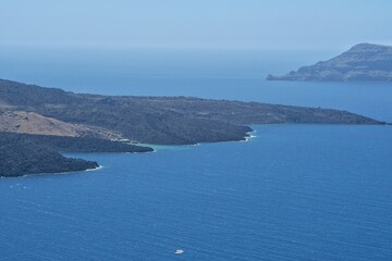 Breathtaking view of the volcano and the Aegean Sea in Santorini on a beautiful day 