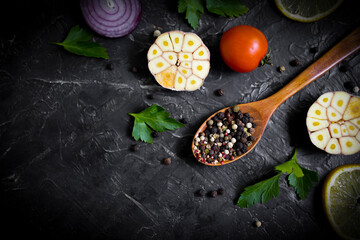 spice pepper in a spoon on a dark background