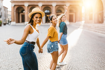 Young group of happy women having fun together on Italy during summer vacation - Joyful female...