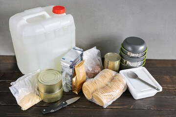 Set of food products for long-term storage, container with drinking, need for emergency, with copy...