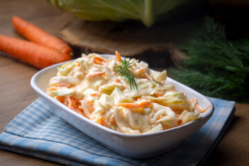 Coleslaw salad close up on a bowl. Cabbage, carrot salad. (Turkish name; lahana salatasi)