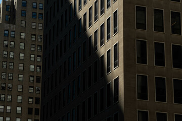 Close up architecture city bright day with light and shadow, abstract look, windows and architecture