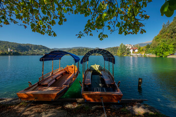 Naklejka na ściany i meble Bled lake. Pletna boats. Slovenia 