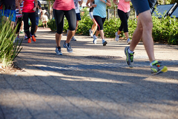 The power of the pack. Cropped shot of a group of people running.