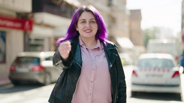Young plus size woman smiling confident shake hand at street