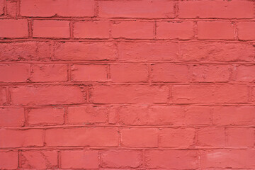 textured brick wall painted in red color