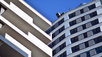 Fragment of modern residential apartment with flat buildings exterior. Detail of new luxury house and home complex.  