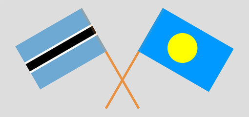Crossed flags of Botswana and Palau. Official colors. Correct proportion