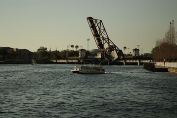 Fototapeta na wymiar Boat on the water in Channelside Tampa near the riverwalk