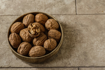 walnuts in a shell in a bowl