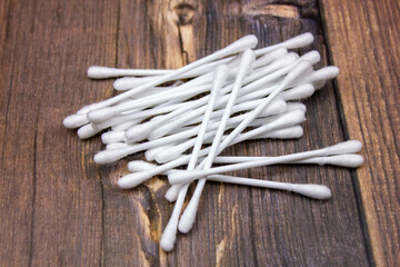 Cotton buds close-up. White cotton swabs. Sticks for cleaning and hygiene of the ears.