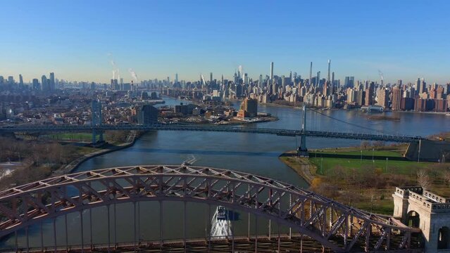 Aerial Shot of Tankers Going Under the RFK - and Hell Gate Bridge