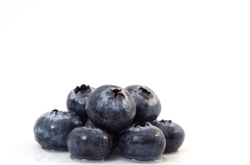 Macro Image of Delicious Wet Blueberries Isolated on White Background