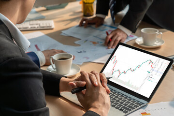 Stock market data chart analysis by ingenious computer software . Investment application display...
