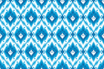 Ikat ethnic seamless pattern design. Aztec fabric carpet mandala ornament boho native chevron textile decoration wallpaper. Tribal turkey African Indian traditional embroidery vector Background 
