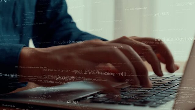 Computer programmer uses capable laptop computer to develop programming code of new software . Computer specialist working on future coding application for software programming development .