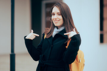 Self-Confident Smiling Girl Pointing to herself 