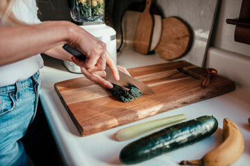 A woman cutting produce