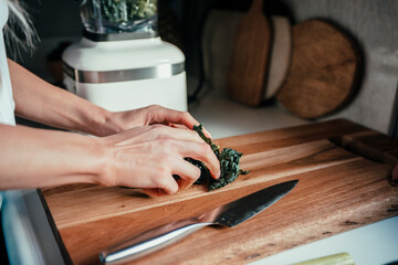 A woman cutting produce