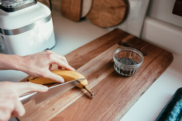 A woman makes a health food smoothie