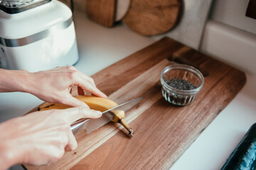 A woman makes a health food smoothie