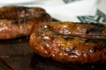 creole sausage typical of the gastronomy of Argentina - obrazy, fototapety, plakaty