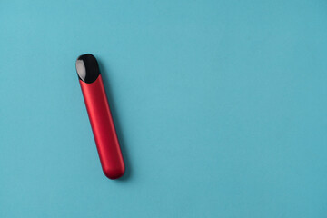 Modern Electronic Cigarette isolated on blue background