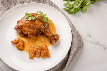 chicken wings roasted on white plate  top view.Delicious chicken wings with sesame. Asian cuisine.thaifood