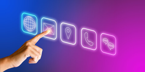 Fototapeta premium Contact us concept. Finger-pointing to icons such as mobile phone, E-mail address, chat, global communication for presentation, web banner, article. Business and network connection and company.