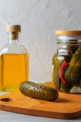 Pickled cucumbers in a jar.