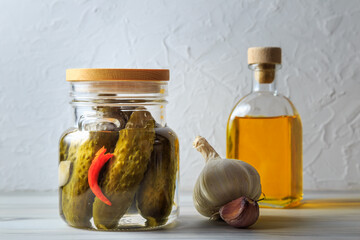 Pickled cucumbers in a jar.