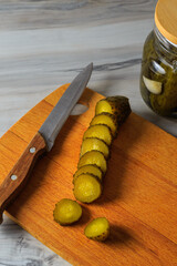 Pickled cucumbers in a jar.