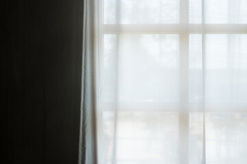 Transparent curtain on window.