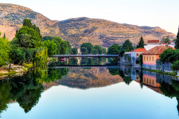 Fototapeta premium River Trebisnjica in sunset in Trebinje, Bosnia and Herzegovina.