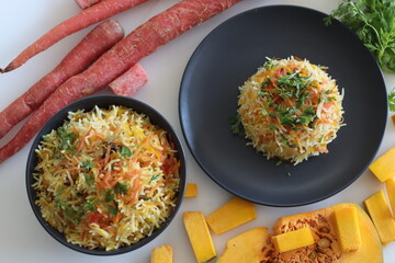 One pot rice preparation with basmati rice, grated pumpkin and carrots. Commonly called as carrot pumpkin pulao