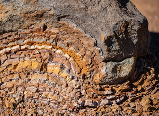 Rugged rock and rubble in golds, red and gray found in the Garden of the Gods on Lanai, Hawaii.