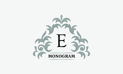 Monogram E. Luxurious floral logo with calligraphic elegant ornament lines. Business sign, identity for restaurant, boutique, cafe, hotel, heraldic, fashion and other vector illustrations