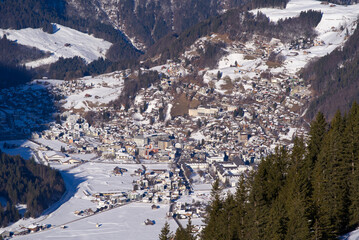 Aerial view of mountain panorama at the Swiss Alps seen from ski resort Engelberg, focus on background. Photo taken February 9th, 2022, Engelberg, Switzerland.