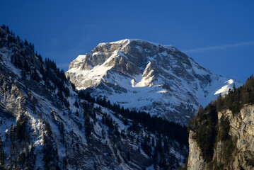 Aerial view of mountain panorama at the Swiss Alps seen from ski resort Engelberg, focus on...