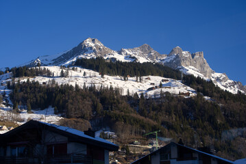 Aerial view of mountain panorama at the Swiss Alps seen from ski resort Engelberg, focus on...