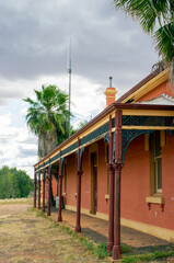 View along station verandah with lace ironwork decoration  