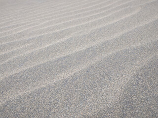 Close up of sand dunes featuring desert, texture, and sand.