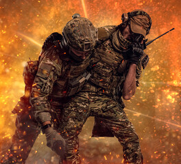Combat conflict, special mission. The military soldier carrying teammate out of the battlefield....