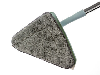 The mop is triangular with interchangeable nozzles.